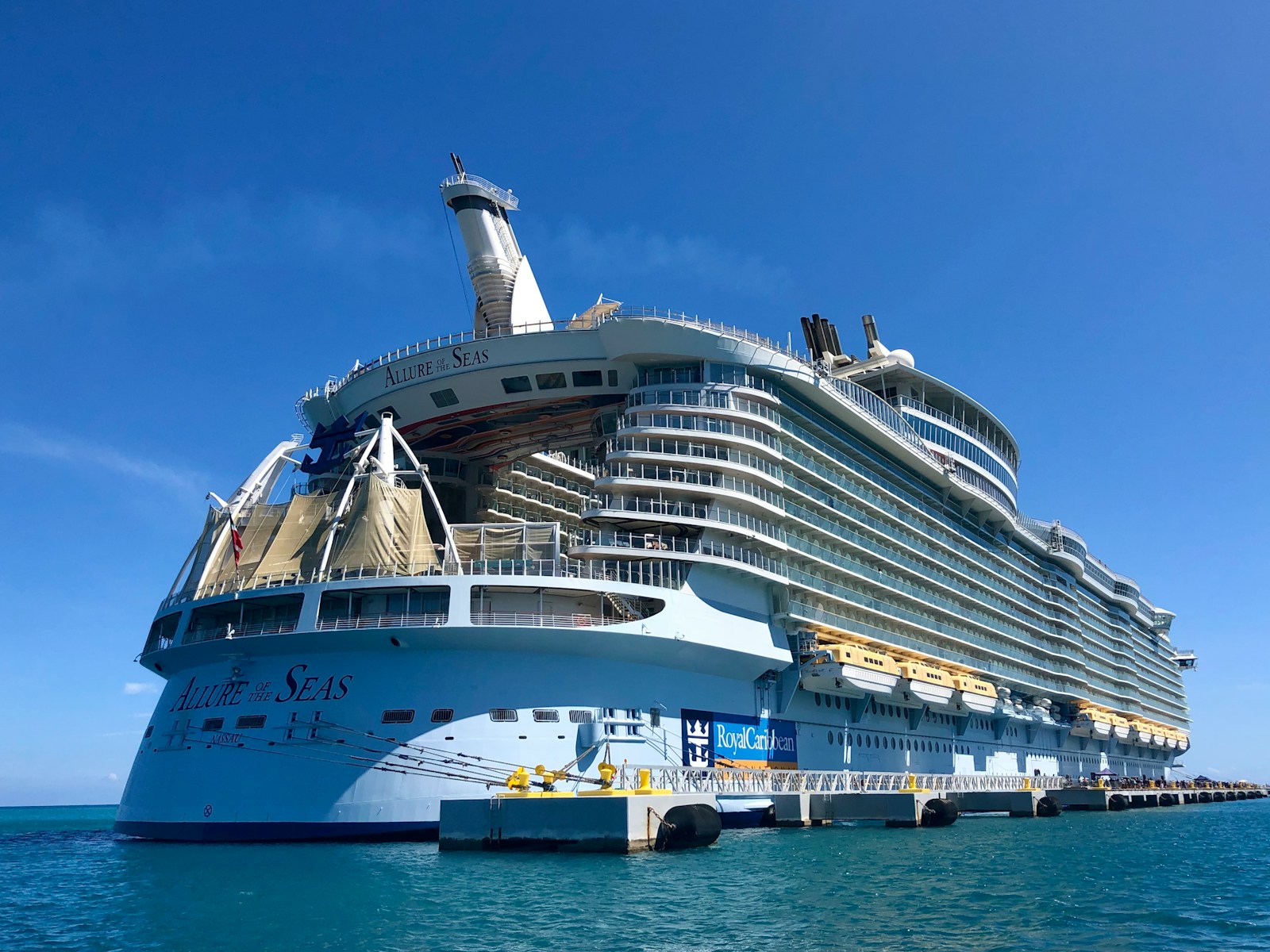 white cruise ship on sea during daytime