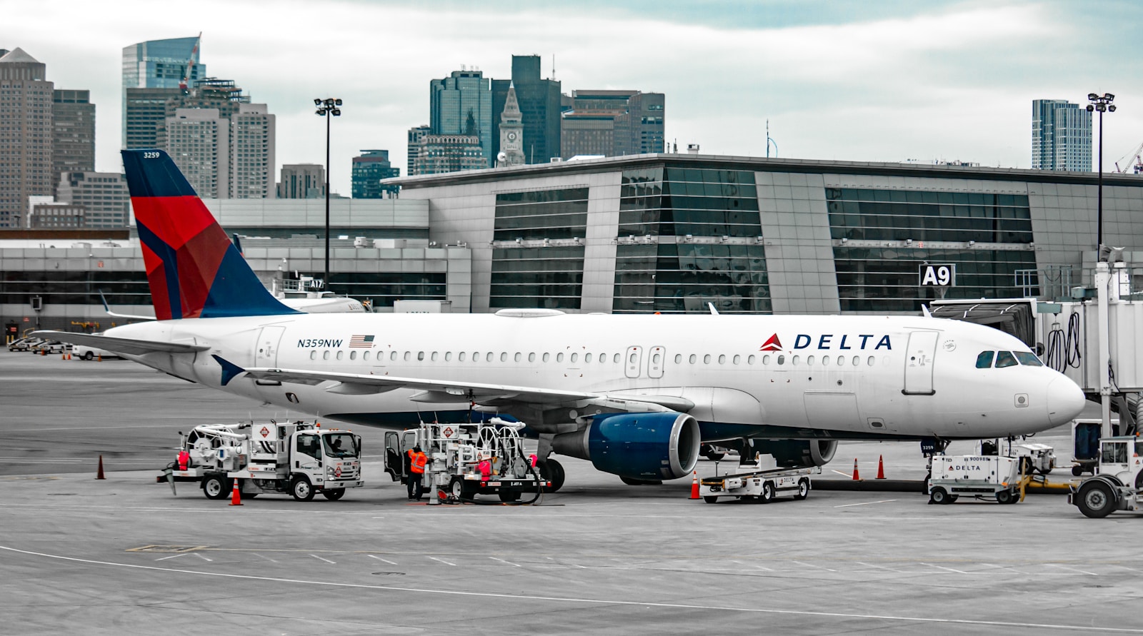 white passenger plane on airport during daytime