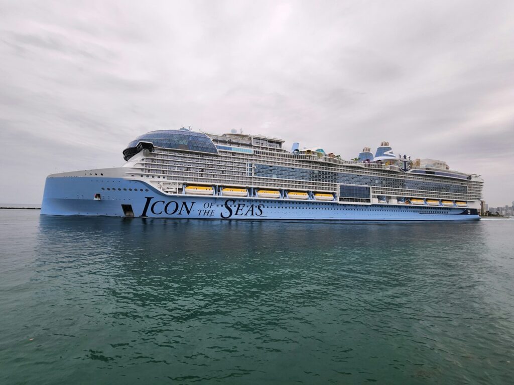 A large cruise ship in the middle of the ocean