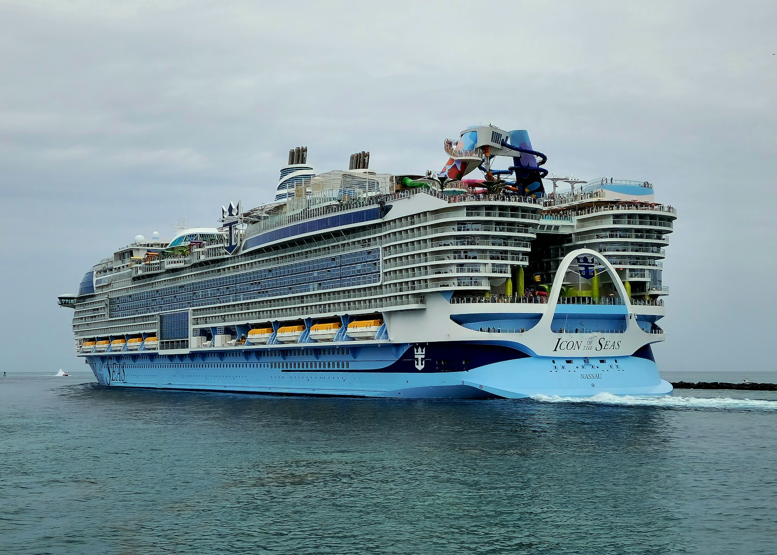 A large cruise ship in the middle of the ocean